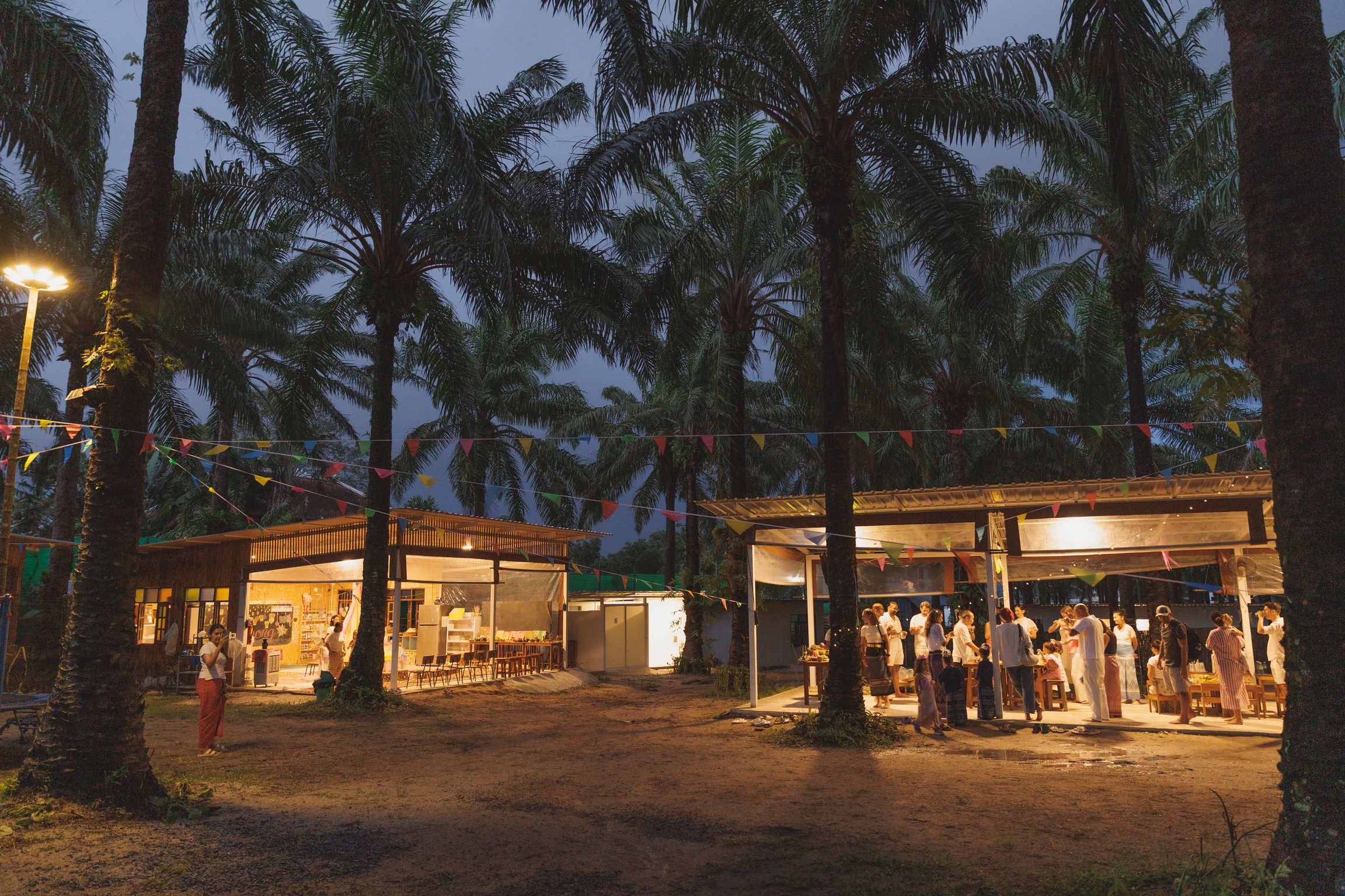 Evening community gathering at Bamboo Valley